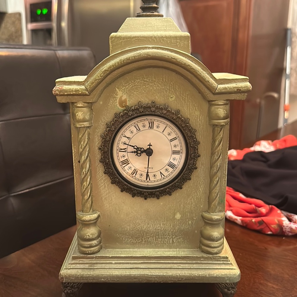 Antique jewelry chest with clock.